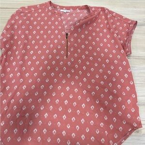 Maurices Coral Short Sleeve Zip-Notch Blouse with White Print